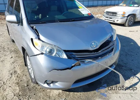 2012 Toyota Sienna Xle V6 8 Passenger z USA, uszkodzony, nr VIN 5TDYK3DC7CS199679